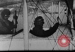 Image of Loading bombs in cockpit of German airplane France, 1917, second 18 stock footage video 65675055374