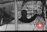 Image of Loading bombs in cockpit of German airplane France, 1917, second 21 stock footage video 65675055374