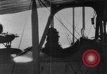 Image of Loading bombs in cockpit of German airplane France, 1917, second 39 stock footage video 65675055374