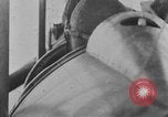 Image of Loading bombs in cockpit of German airplane France, 1917, second 50 stock footage video 65675055374