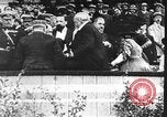 Image of Crowd gathered to watch Wright Flyer airplane demonstration in Le Mans France Le Mans France, 1908, second 3 stock footage video 65675055378