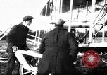 Image of Crowd gathered to watch Wright Flyer airplane demonstration in Le Mans France Le Mans France, 1908, second 6 stock footage video 65675055378