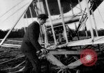 Image of Crowd gathered to watch Wright Flyer airplane demonstration in Le Mans France Le Mans France, 1908, second 8 stock footage video 65675055378