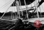 Image of Crowd gathered to watch Wright Flyer airplane demonstration in Le Mans France Le Mans France, 1908, second 11 stock footage video 65675055378