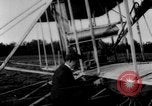 Image of Crowd gathered to watch Wright Flyer airplane demonstration in Le Mans France Le Mans France, 1908, second 12 stock footage video 65675055378