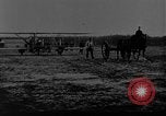 Image of Crowd gathered to watch Wright Flyer airplane demonstration in Le Mans France Le Mans France, 1908, second 14 stock footage video 65675055378