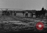 Image of Crowd gathered to watch Wright Flyer airplane demonstration in Le Mans France Le Mans France, 1908, second 16 stock footage video 65675055378