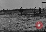 Image of Crowd gathered to watch Wright Flyer airplane demonstration in Le Mans France Le Mans France, 1908, second 17 stock footage video 65675055378
