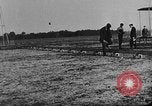 Image of Crowd gathered to watch Wright Flyer airplane demonstration in Le Mans France Le Mans France, 1908, second 19 stock footage video 65675055378