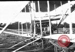Image of Crowd gathered to watch Wright Flyer airplane demonstration in Le Mans France Le Mans France, 1908, second 21 stock footage video 65675055378