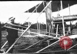 Image of Crowd gathered to watch Wright Flyer airplane demonstration in Le Mans France Le Mans France, 1908, second 22 stock footage video 65675055378