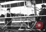 Image of Crowd gathered to watch Wright Flyer airplane demonstration in Le Mans France Le Mans France, 1908, second 24 stock footage video 65675055378