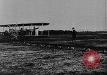 Image of Crowd gathered to watch Wright Flyer airplane demonstration in Le Mans France Le Mans France, 1908, second 26 stock footage video 65675055378