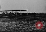 Image of Crowd gathered to watch Wright Flyer airplane demonstration in Le Mans France Le Mans France, 1908, second 27 stock footage video 65675055378