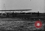 Image of Crowd gathered to watch Wright Flyer airplane demonstration in Le Mans France Le Mans France, 1908, second 28 stock footage video 65675055378
