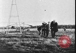 Image of Crowd gathered to watch Wright Flyer airplane demonstration in Le Mans France Le Mans France, 1908, second 30 stock footage video 65675055378