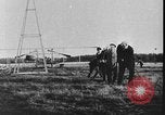 Image of Crowd gathered to watch Wright Flyer airplane demonstration in Le Mans France Le Mans France, 1908, second 31 stock footage video 65675055378