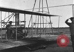 Image of Crowd gathered to watch Wright Flyer airplane demonstration in Le Mans France Le Mans France, 1908, second 37 stock footage video 65675055378