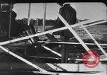 Image of Crowd gathered to watch Wright Flyer airplane demonstration in Le Mans France Le Mans France, 1908, second 39 stock footage video 65675055378