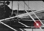Image of Crowd gathered to watch Wright Flyer airplane demonstration in Le Mans France Le Mans France, 1908, second 43 stock footage video 65675055378