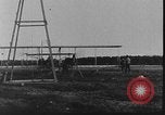Image of Crowd gathered to watch Wright Flyer airplane demonstration in Le Mans France Le Mans France, 1908, second 45 stock footage video 65675055378