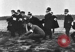 Image of Crowd gathered to watch Wright Flyer airplane demonstration in Le Mans France Le Mans France, 1908, second 49 stock footage video 65675055378