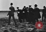 Image of Crowd gathered to watch Wright Flyer airplane demonstration in Le Mans France Le Mans France, 1908, second 51 stock footage video 65675055378
