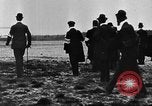 Image of Crowd gathered to watch Wright Flyer airplane demonstration in Le Mans France Le Mans France, 1908, second 52 stock footage video 65675055378