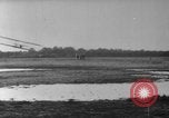 Image of Crowd gathered to watch Wright Flyer airplane demonstration in Le Mans France Le Mans France, 1908, second 54 stock footage video 65675055378