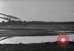 Image of Crowd gathered to watch Wright Flyer airplane demonstration in Le Mans France Le Mans France, 1908, second 55 stock footage video 65675055378