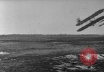 Image of Crowd gathered to watch Wright Flyer airplane demonstration in Le Mans France Le Mans France, 1908, second 58 stock footage video 65675055378