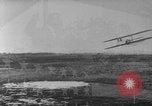 Image of Crowd gathered to watch Wright Flyer airplane demonstration in Le Mans France Le Mans France, 1908, second 59 stock footage video 65675055378