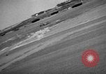Image of hangars and airfield European Theater, 1944, second 18 stock footage video 65675055420