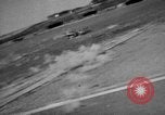 Image of hangars and airfield European Theater, 1944, second 21 stock footage video 65675055420