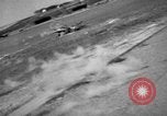 Image of hangars and airfield European Theater, 1944, second 22 stock footage video 65675055420