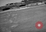 Image of hangars and airfield European Theater, 1944, second 24 stock footage video 65675055420