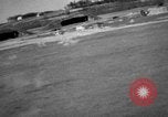 Image of hangars and airfield European Theater, 1944, second 26 stock footage video 65675055420