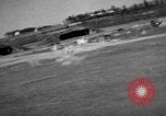 Image of hangars and airfield European Theater, 1944, second 27 stock footage video 65675055420