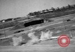 Image of hangars and airfield European Theater, 1944, second 30 stock footage video 65675055420