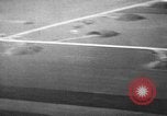 Image of hangars and airfield European Theater, 1944, second 31 stock footage video 65675055420