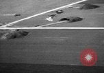 Image of hangars and airfield European Theater, 1944, second 33 stock footage video 65675055420