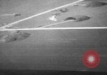 Image of hangars and airfield European Theater, 1944, second 34 stock footage video 65675055420