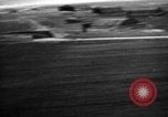 Image of hangars and airfield European Theater, 1944, second 53 stock footage video 65675055420