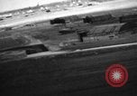 Image of hangars and airfield European Theater, 1944, second 55 stock footage video 65675055420