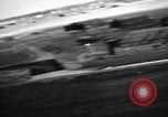 Image of hangars and airfield European Theater, 1944, second 56 stock footage video 65675055420