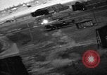 Image of hangars and airfield European Theater, 1944, second 59 stock footage video 65675055420