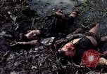 Image of dead Viet Cong Vietnam Vinh Te Canal, 1969, second 4 stock footage video 65675055543