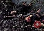 Image of dead Viet Cong Vietnam Vinh Te Canal, 1969, second 6 stock footage video 65675055543
