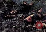 Image of dead Viet Cong Vietnam Vinh Te Canal, 1969, second 7 stock footage video 65675055543