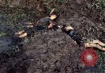 Image of dead Viet Cong Vietnam Vinh Te Canal, 1969, second 20 stock footage video 65675055543